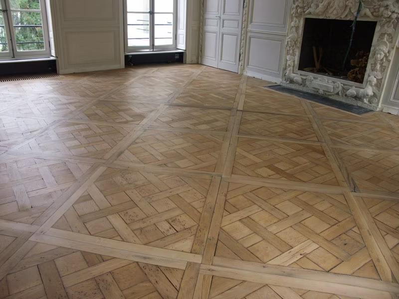 Rénovation de parquet Versailles par Atelier Breton, menuisier à Thouars