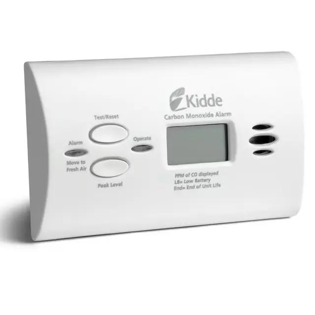 Close-up image of a Kiddie carbon monoxide detector mounted on a wall, displaying a digital reading for safety monitoring. Essential home safety device to detect harmful CO levels.