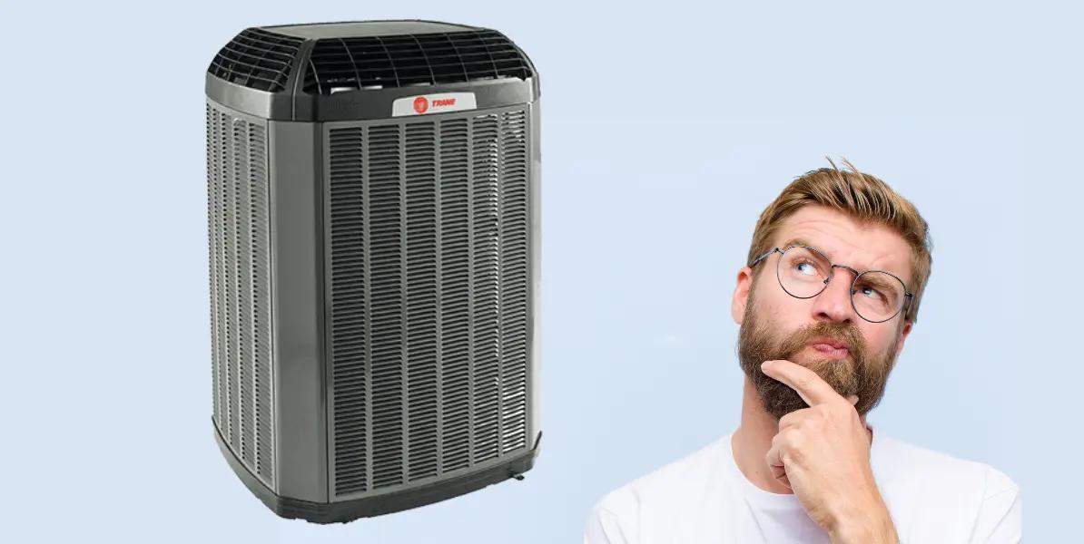 A man is curious about the details and workings of a heat pump.
