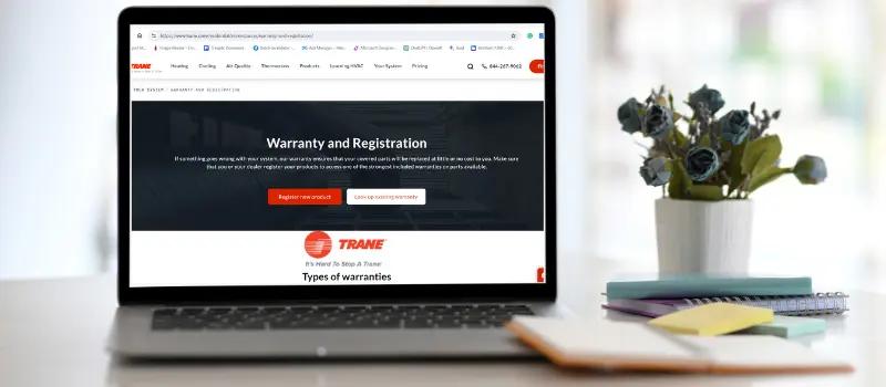 Image of a laptop displaying the Trane equipment registration webpage, highlighting the process of registering HVAC equipment for warranty.
