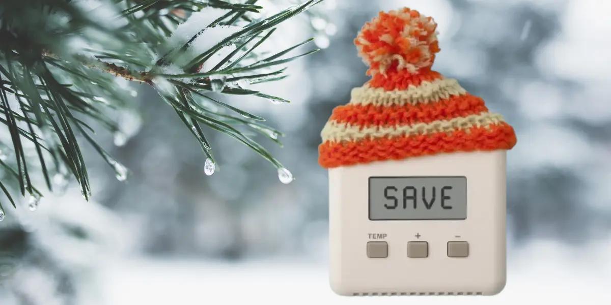 A digital thermostat wearing a cute knit cap, set against a winter-themed background featuring snowflakes and icy blue hues, symbolizing the need for warmth during cold weather.