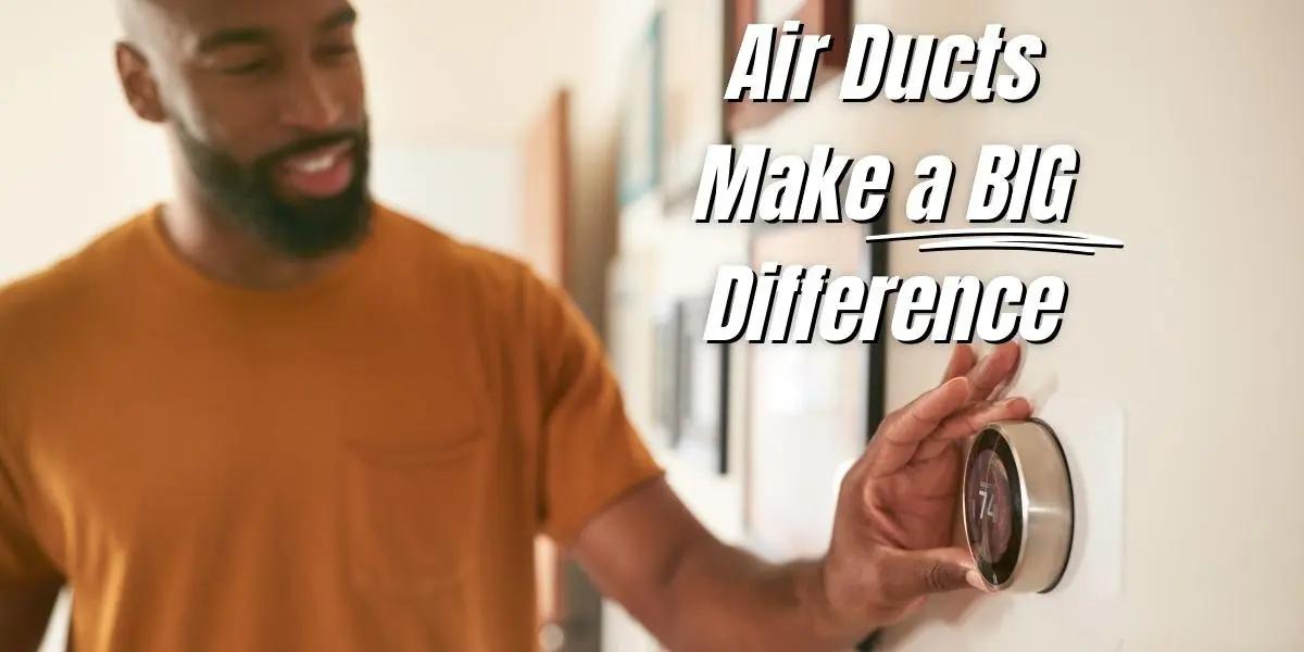 Man adjusting thermostat installed by SS&B Heating & Cooling