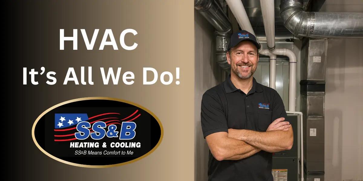 SS&B Heating & Cooling technician in front of a furnace system, representing HVAC service and repair in Springfield, MO.