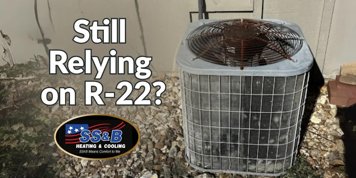 Old outdoor air conditioning unit running on outdated R-22 refrigerant with text “Still Relying on R-22?” and SS&B Heating & Cooling logo.