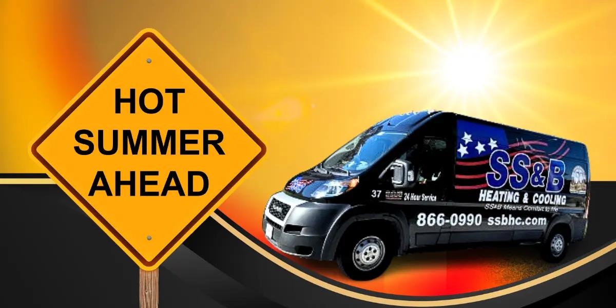 SS&B Heating & Cooling van next to a road sign that reads "Hot Summer Ahead" with a bright sun in the background, emphasizing the need for AC maintenance and repair services.