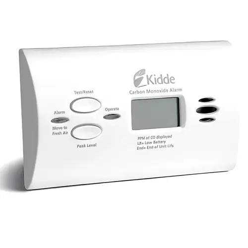 Close-up image of a Kidde battery-operated carbon monoxide alarm with a digital display, showcasing essential features like peak level memory, test/reset buttons, and status indicators. Ideal for home safety and CO detection.