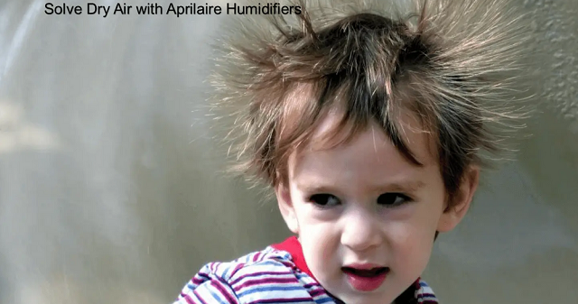 Boy experiencing static hair due to dry air, showcasing the need for the Aprilaire 800 Steam Humidifier for optimal indoor humidity.