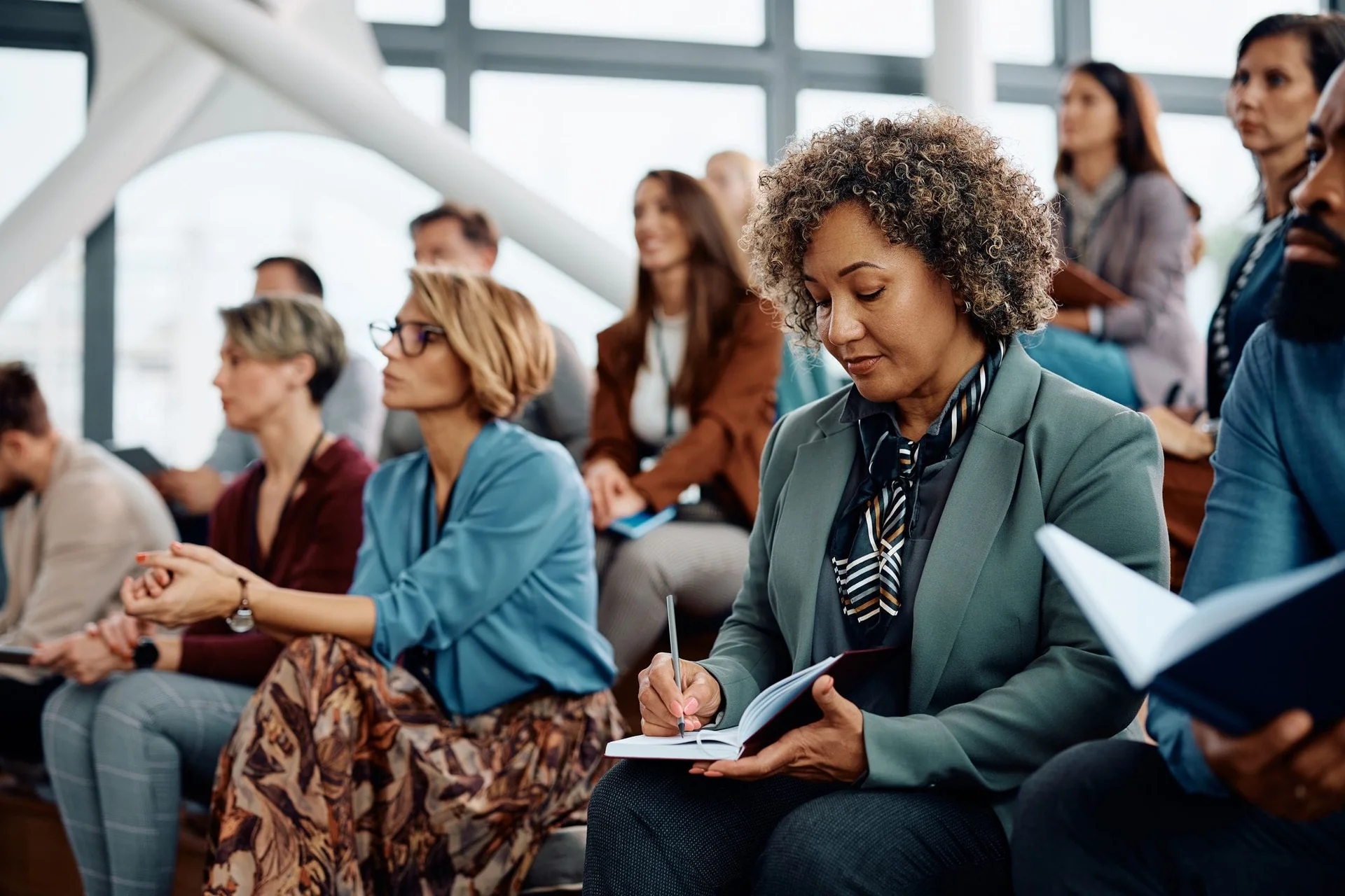 An audience listening during a training session