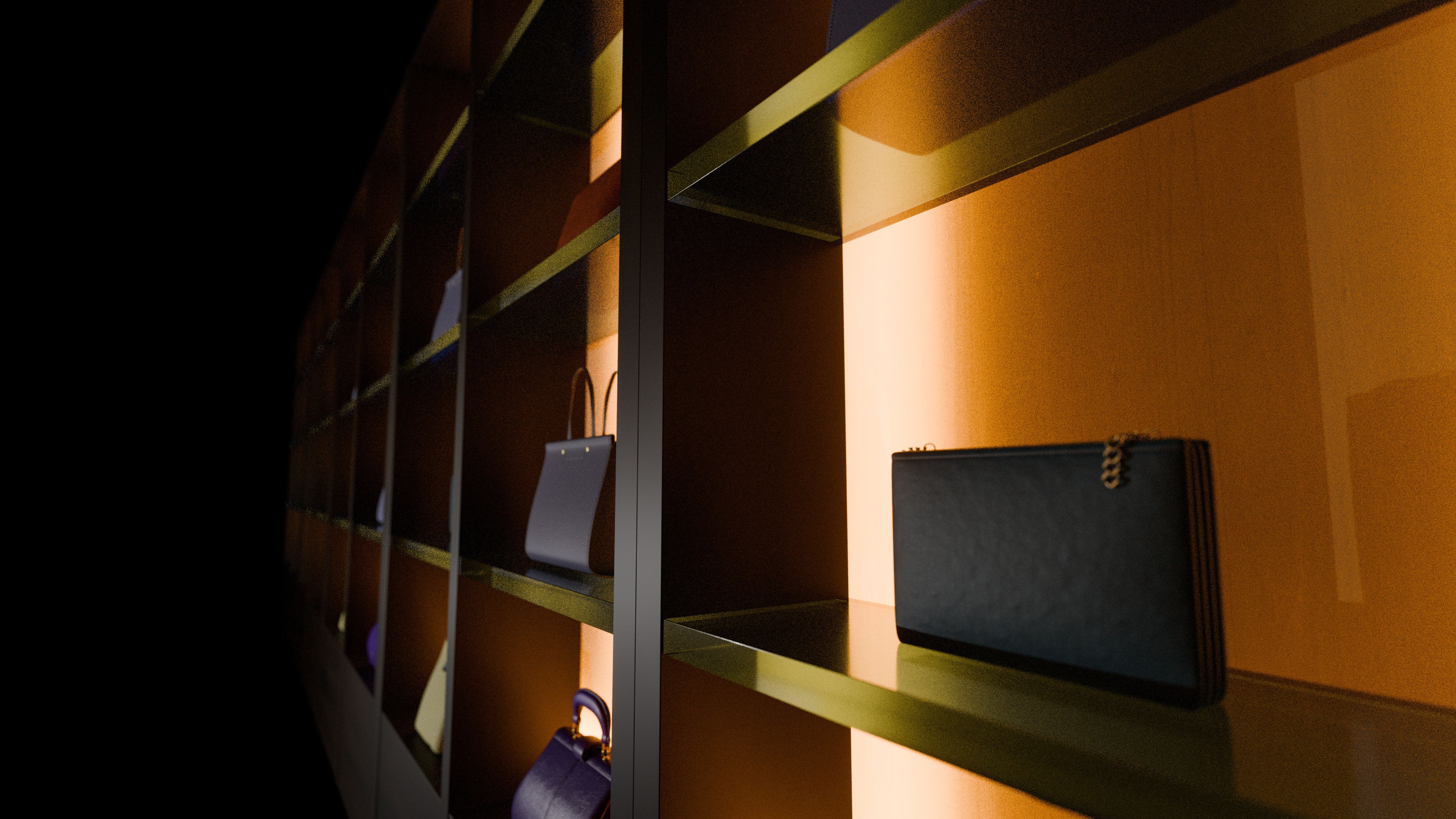 Luxury handbags displayed on warmly lit retail shelves