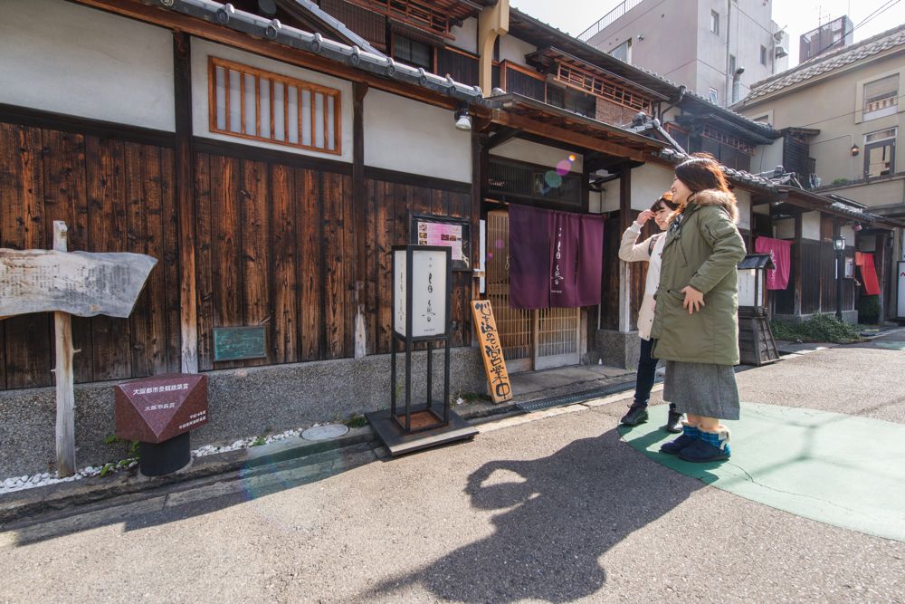 Behind the station you'll find stylish shops in restored Japanese rowhouses.