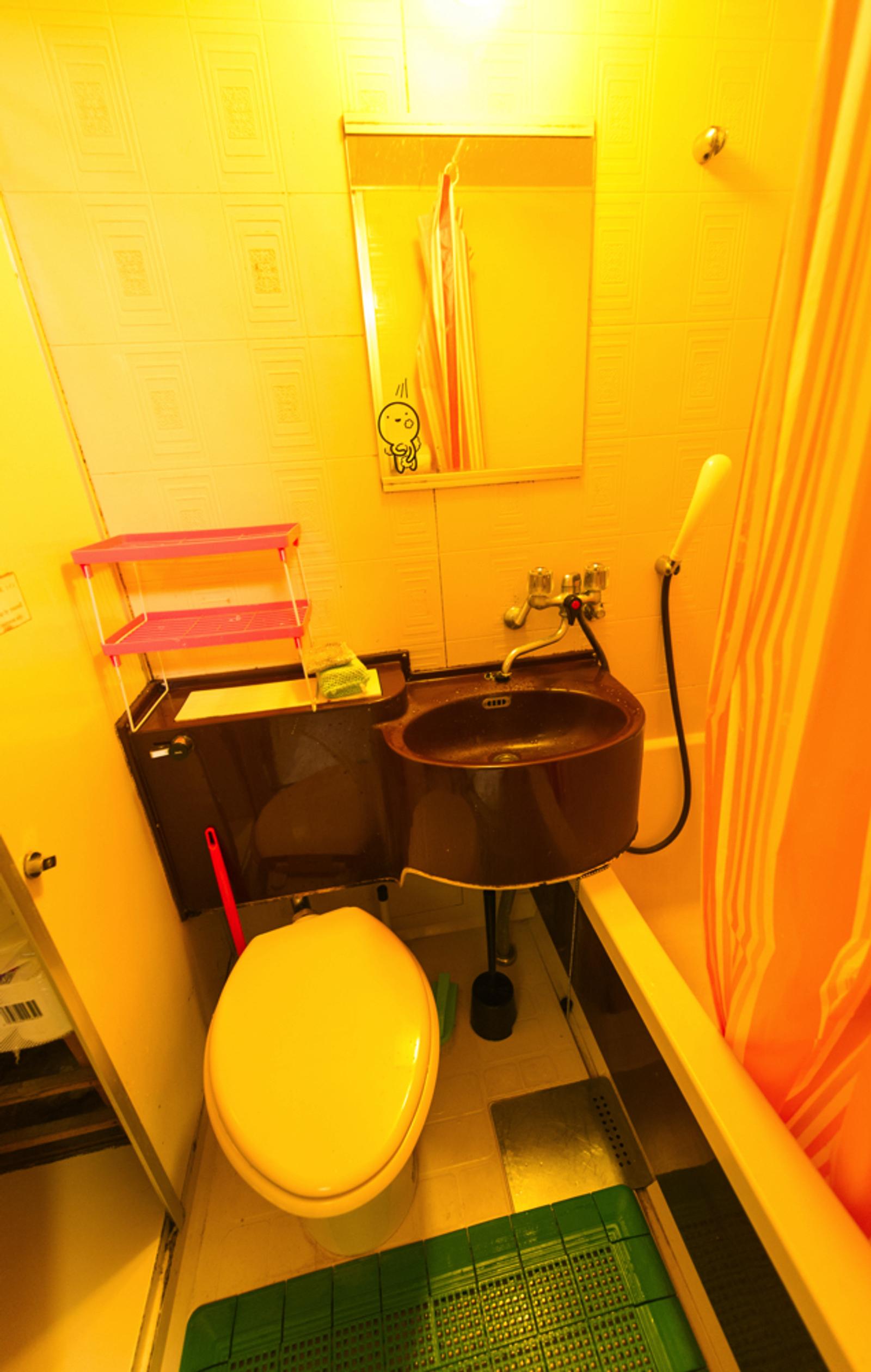 Bathroom with sink, toilet, shower, and bathtub