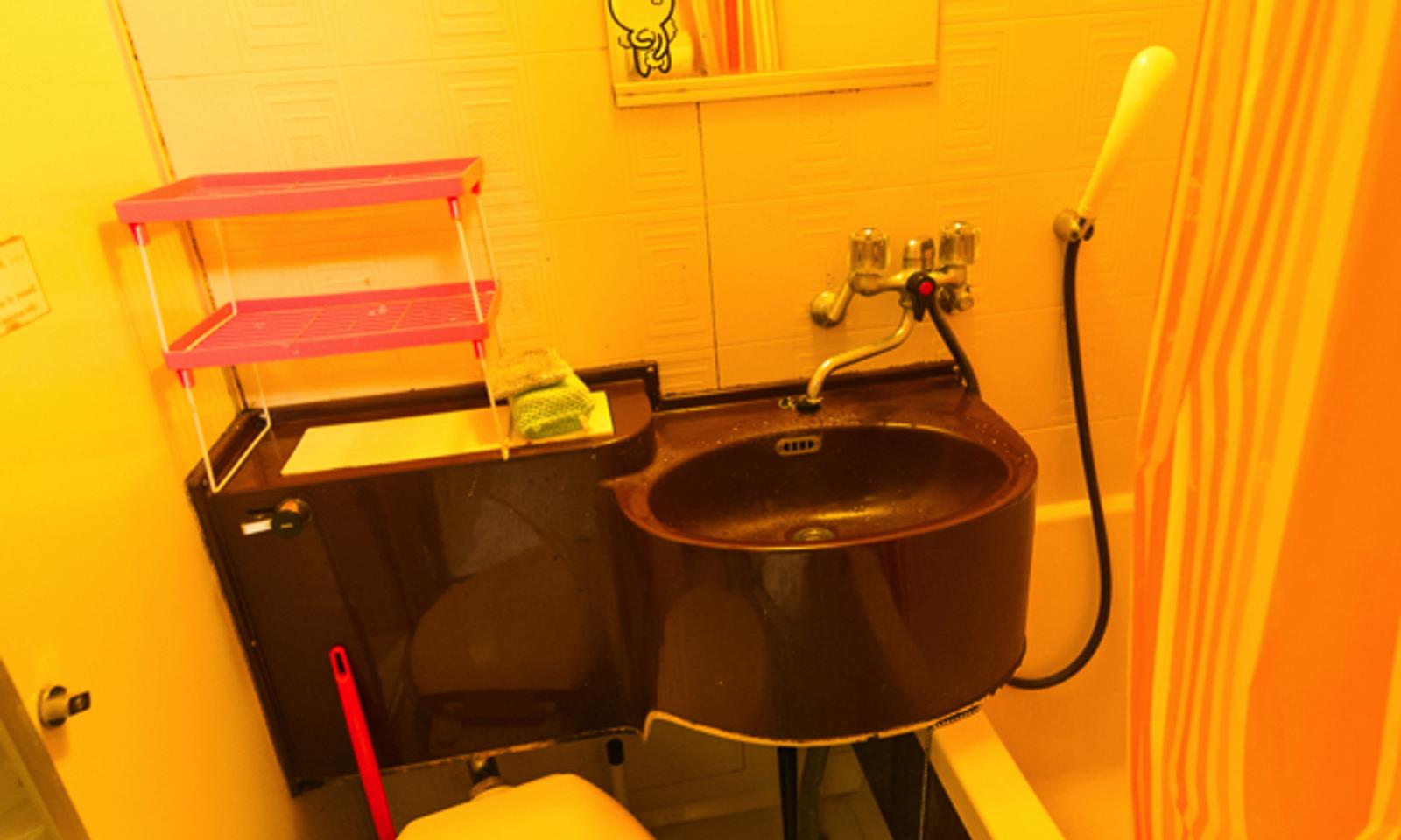 Bathroom with sink, toilet, shower, and bathtub