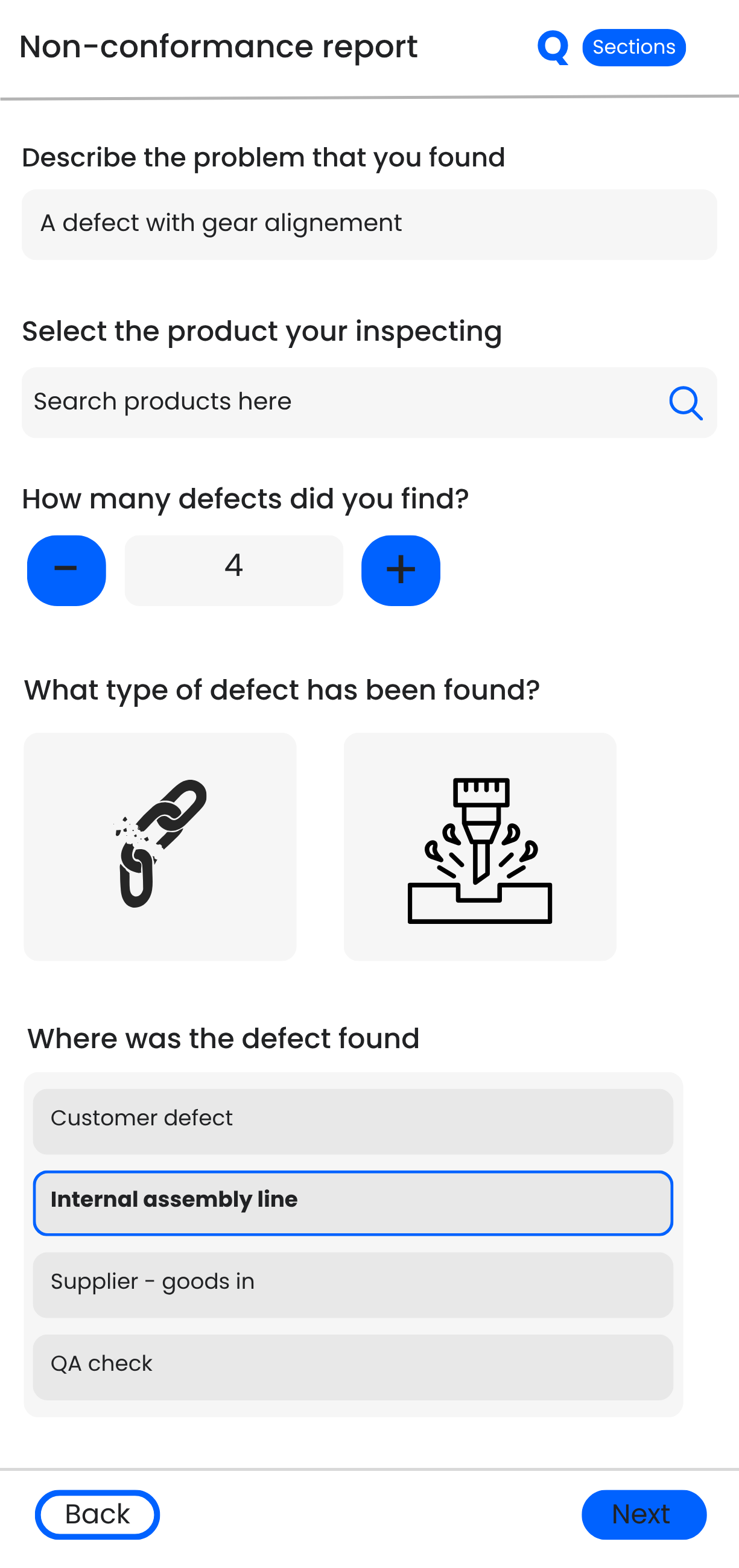 Q-Hub mobile app screen for logging a non-conformance report, including defect type and location on the assembly line