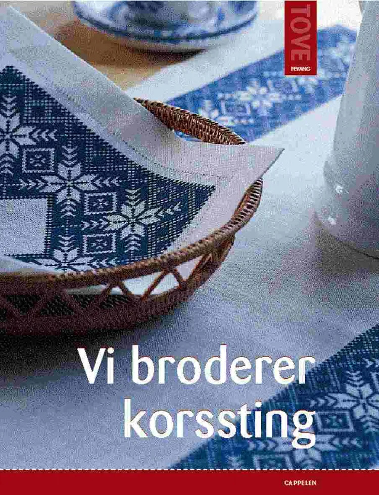 Omslag Vi broderer korssting av Tove Fevang (Innbundet)