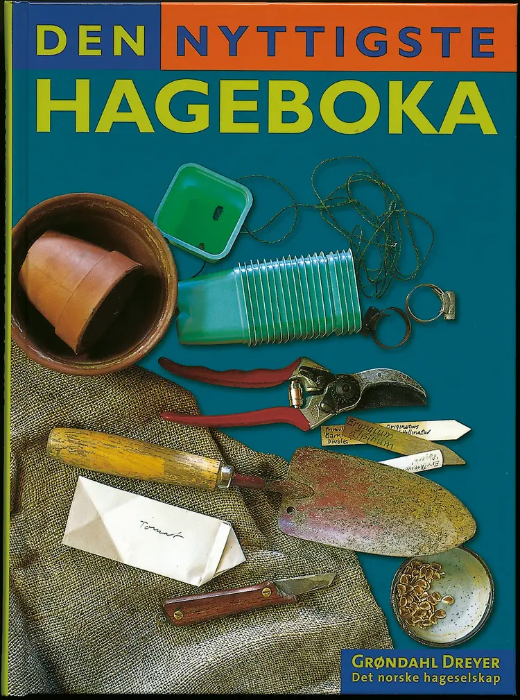 Omslag Den nyttigste hageboka av Hageselskapet (Innbundet)