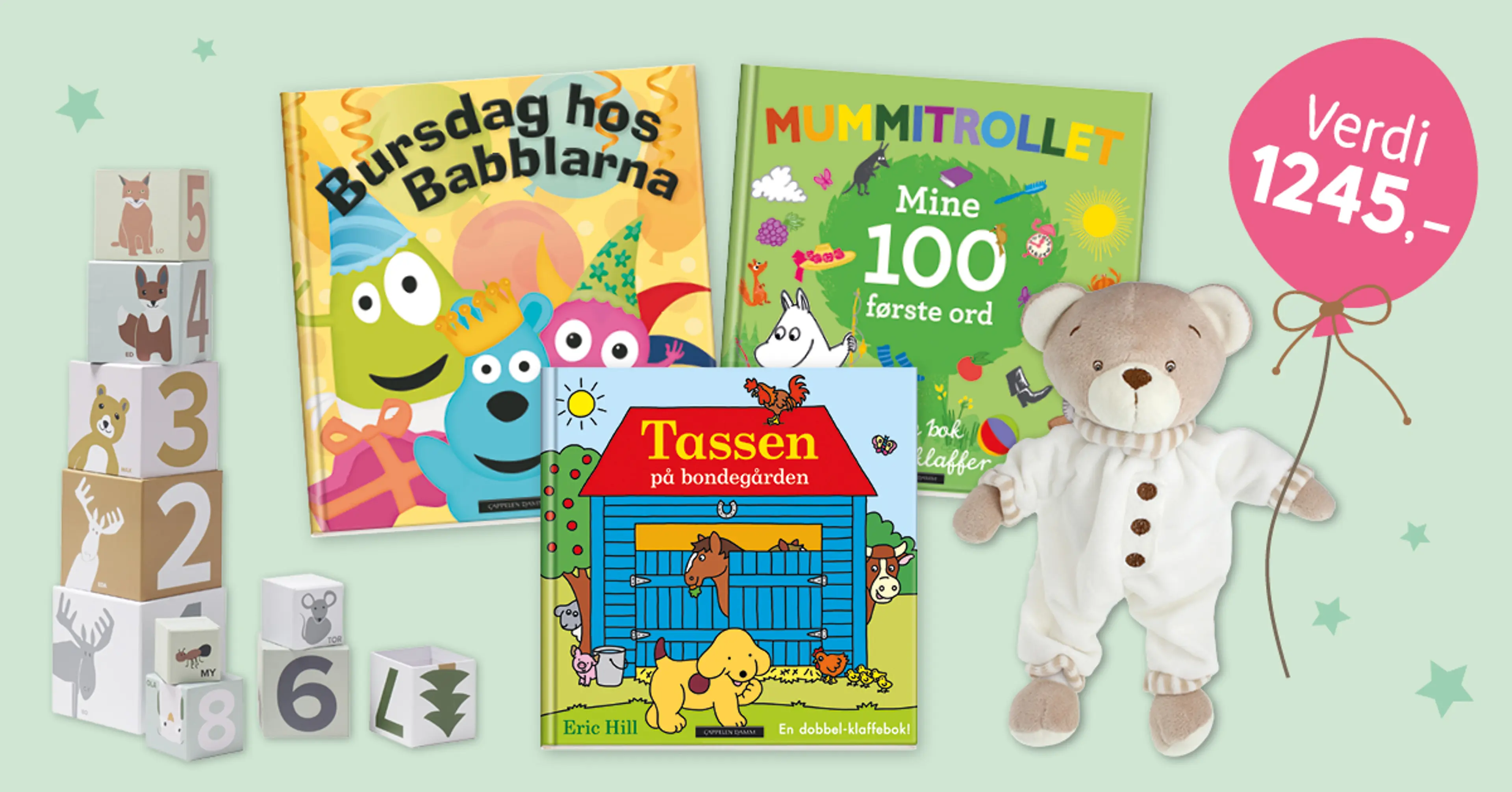 Velkomstpakke med stableklosser en bamse, og 3 babybøker