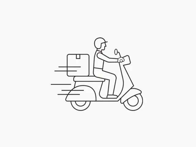 Bilde av mann på scooter