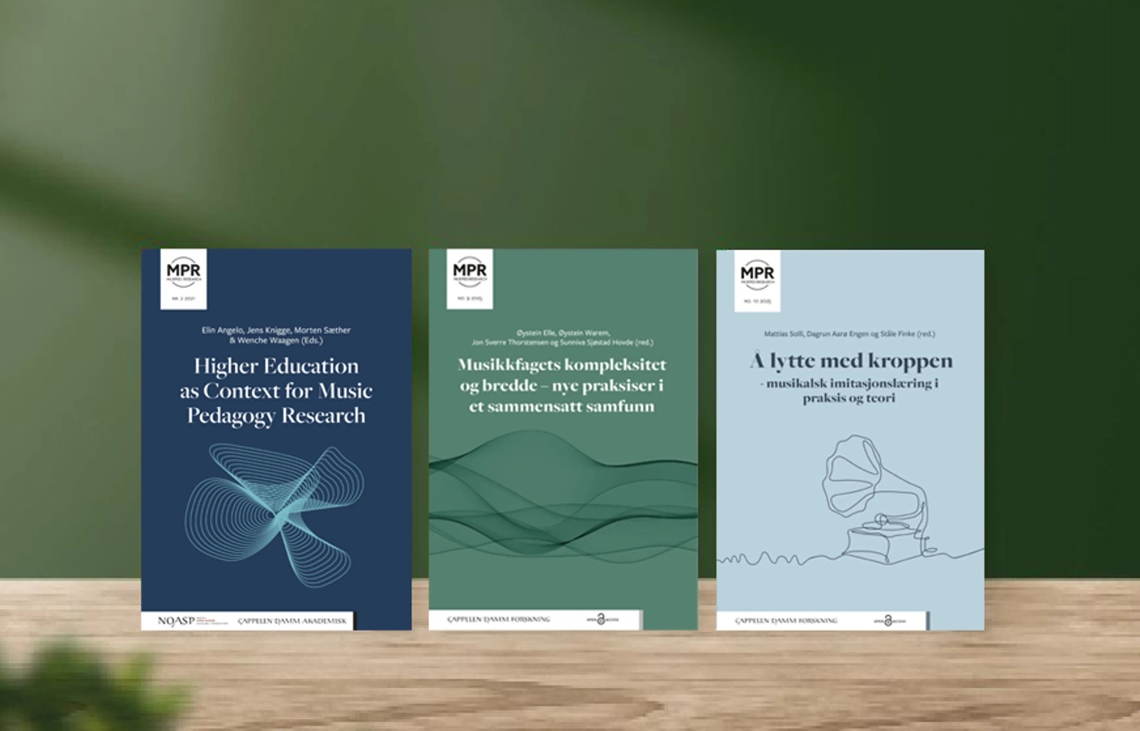 Bilde av bokrygger på bøker utgitt med åpen tilgang i serien MusPed:Research