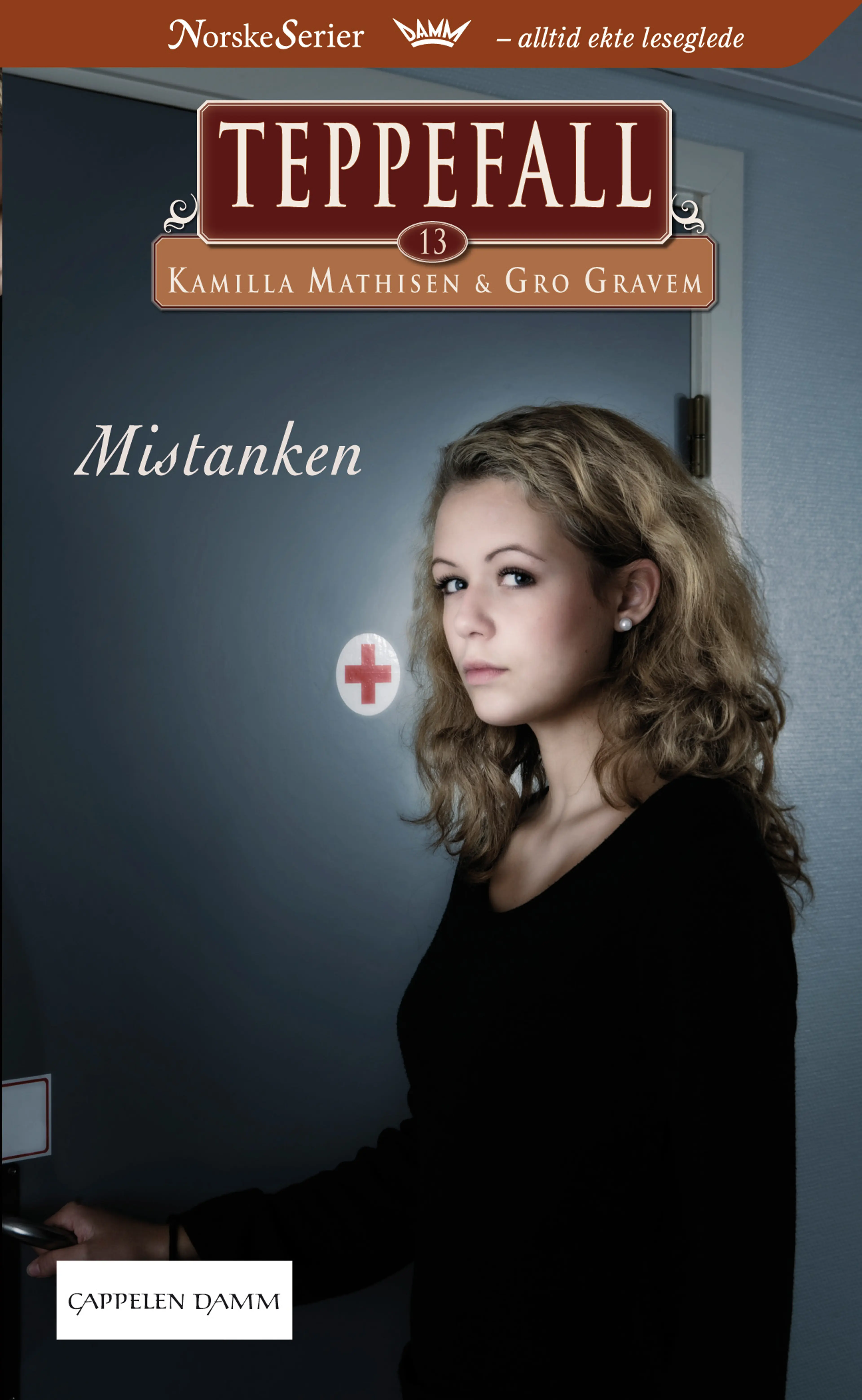 Omslag Mistanken av Kamilla Mathisen og Gro Gravem (Heftet)