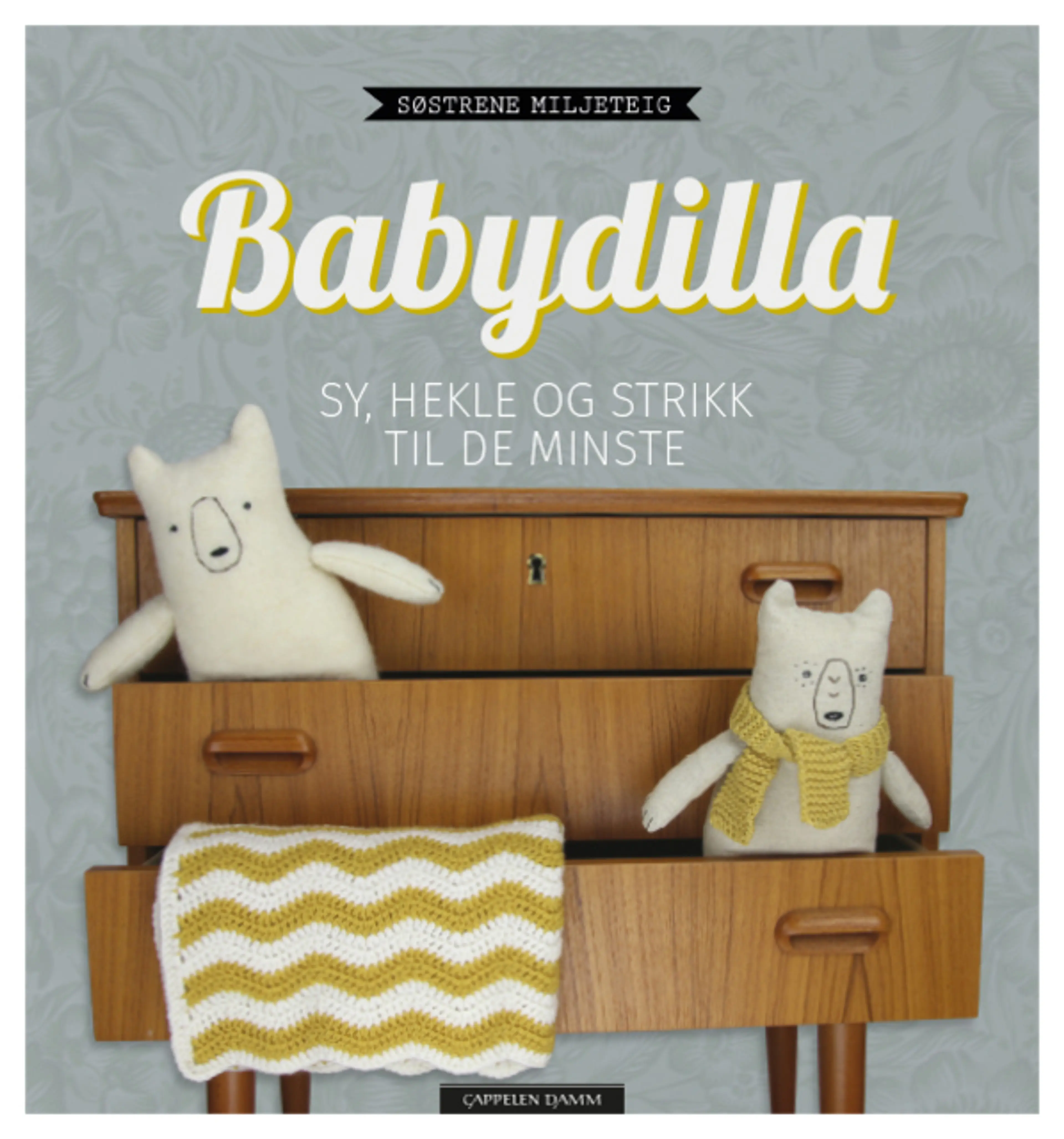 Omslag Babydilla – sy, hekle og strikk til de minste av Søstrene Miljeteig (Innbundet)
