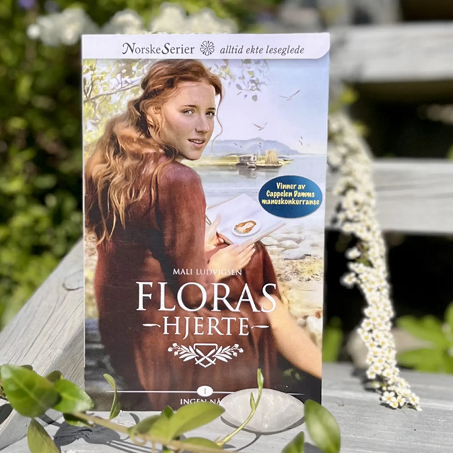 Foto av første bok i serien Floras hjerte