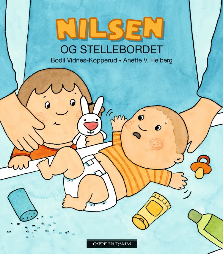 Omslag Nilsen og stellebordet av Bodil Vidnes-Kopperud og Anette V. Heiberg (Innbundet)