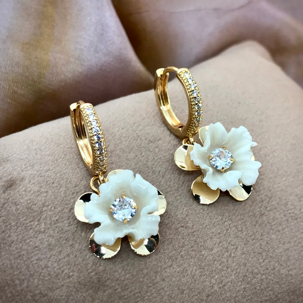 Porselens smykker med gull