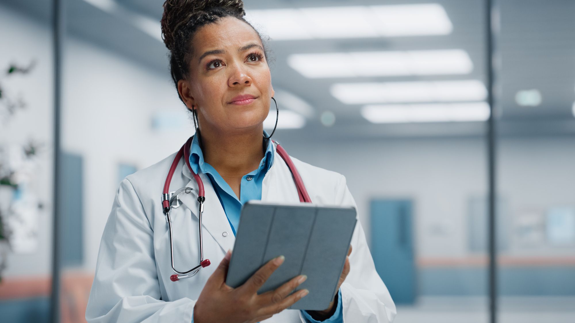 Multi-specialty clinical team reviewing performance data