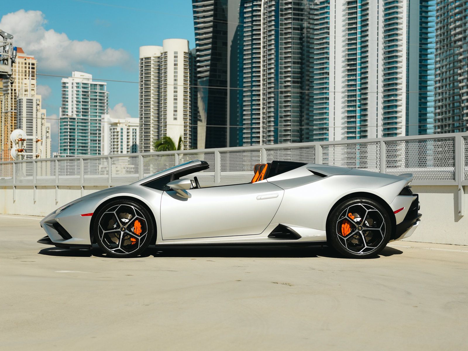 Matte Silver Lamborghini Huracán Evo Spyder for rent in Miami