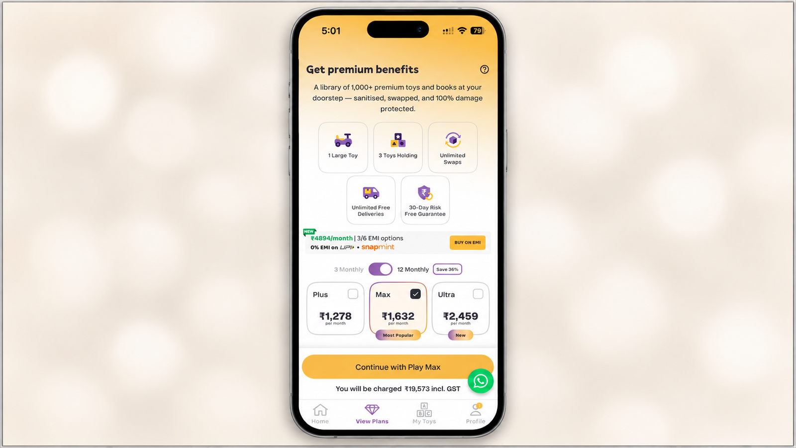 16:9 product mockup showing a centered smartphone displaying a premium toy subscription screen. The screen features “Get premium benefits,” five membership benefits, EMI information, Plus, Max, and Ultra plans with Max selected, a “Continue with Play Max” button, and bottom navigation. The phone is set against a softly blurred cream background with a thin black border around the outer edges.