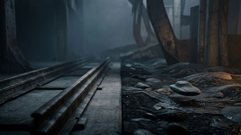 Dark industrial tunnel with railway tracks and rocky ground symbolizing infrastructure, system architecture, and product journey complexity