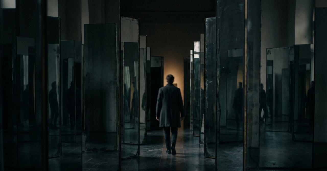 Dark hallway with mirrors representing the complexity and uncertainty of debugging mobile app issues across fragmented environments.