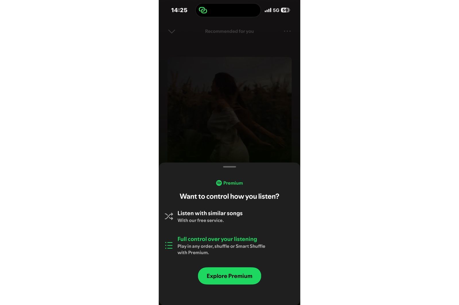 Spotify Premium upgrade prompt encouraging users to unlock full playback control, including track selection, shuffle options, and unrestricted listening.