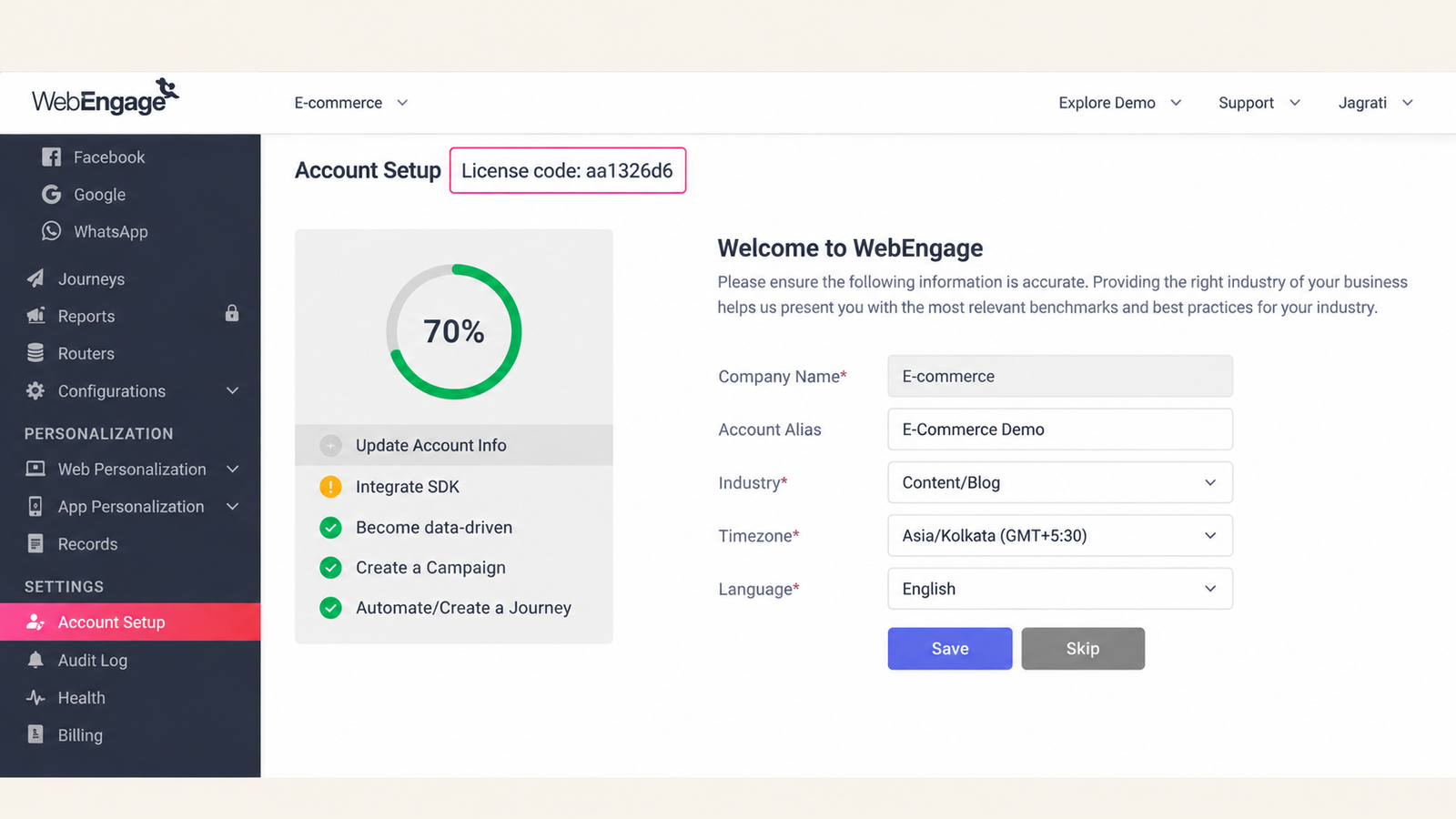 WebEngage “Account Setup” dashboard showing a 70% setup progress indicator, onboarding checklist, license code, and account information form with company name, account alias, industry, timezone, language, and Save/Skip buttons.
