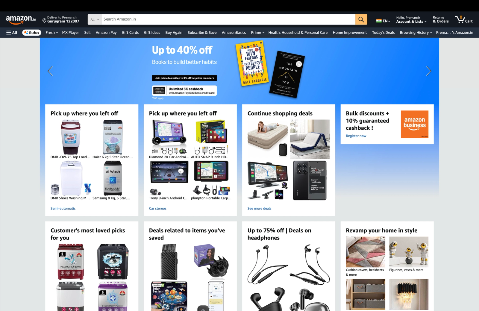 Amazon homepage featuring a personalized shopping experience with recommendation sections such as "Pick up where you left off," "Continue shopping deals," "Customer's most loved picks for you," and "Deals related to items you've saved." The page also includes a promotional banner for discounted books and curated product suggestions based on browsing and purchase history.