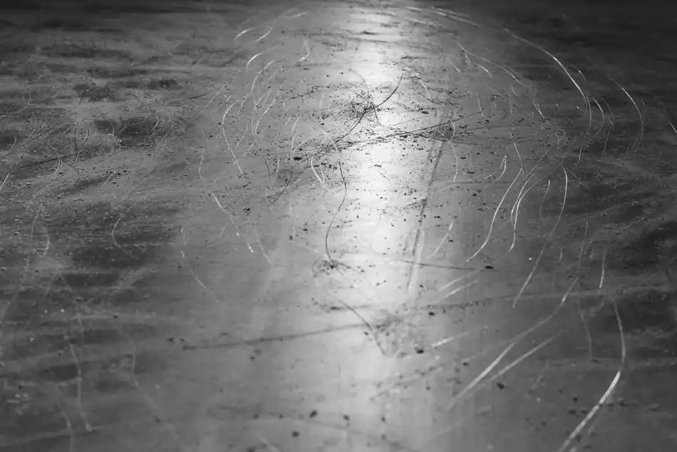 Skate marks across an ice rink