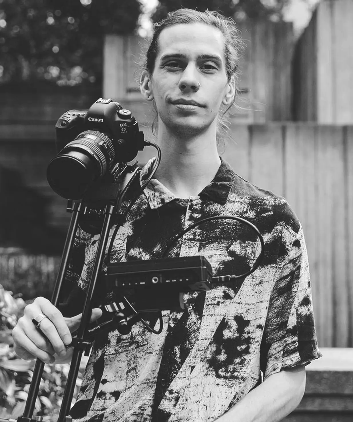 Austin holding a camera rig