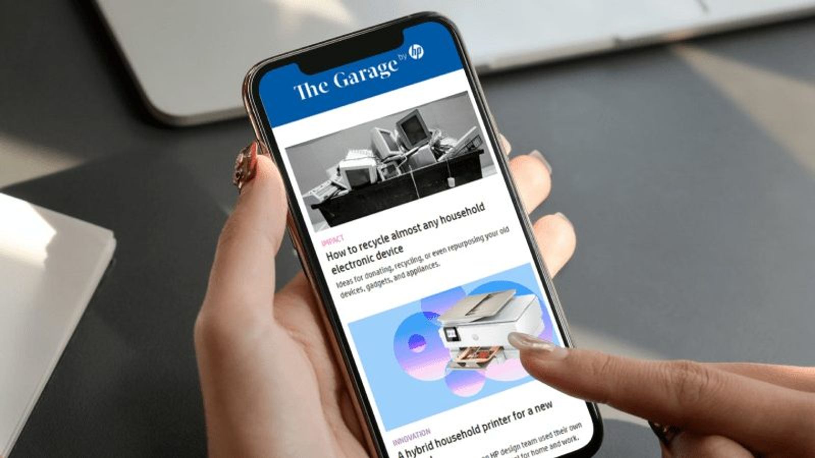 The Garage newsletter on a phone