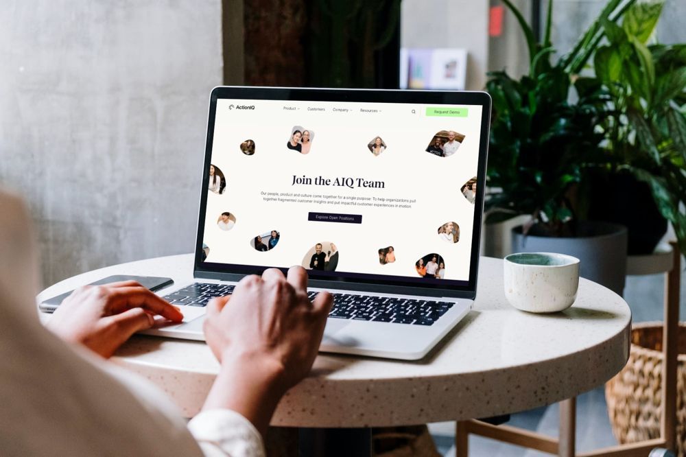 ActionIQ website on a laptop