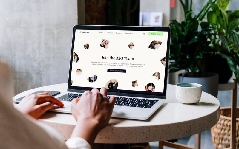 ActionIQ website on a laptop