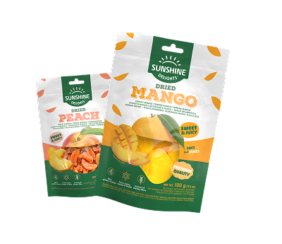 Two pouches of Sunshine Foods dried mango and dried peach.