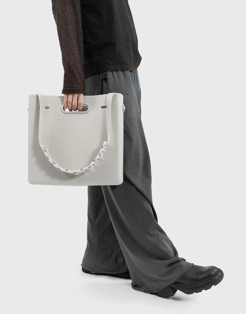 EAST WEST CLUTCH SYSTEM - MEDIUM in OPTIC