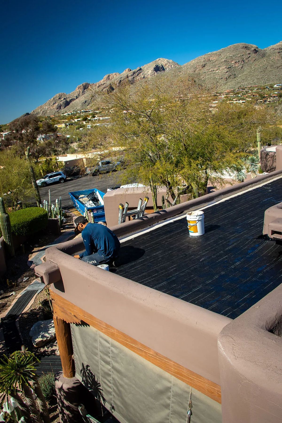 Completed flat roof with desert mountain views