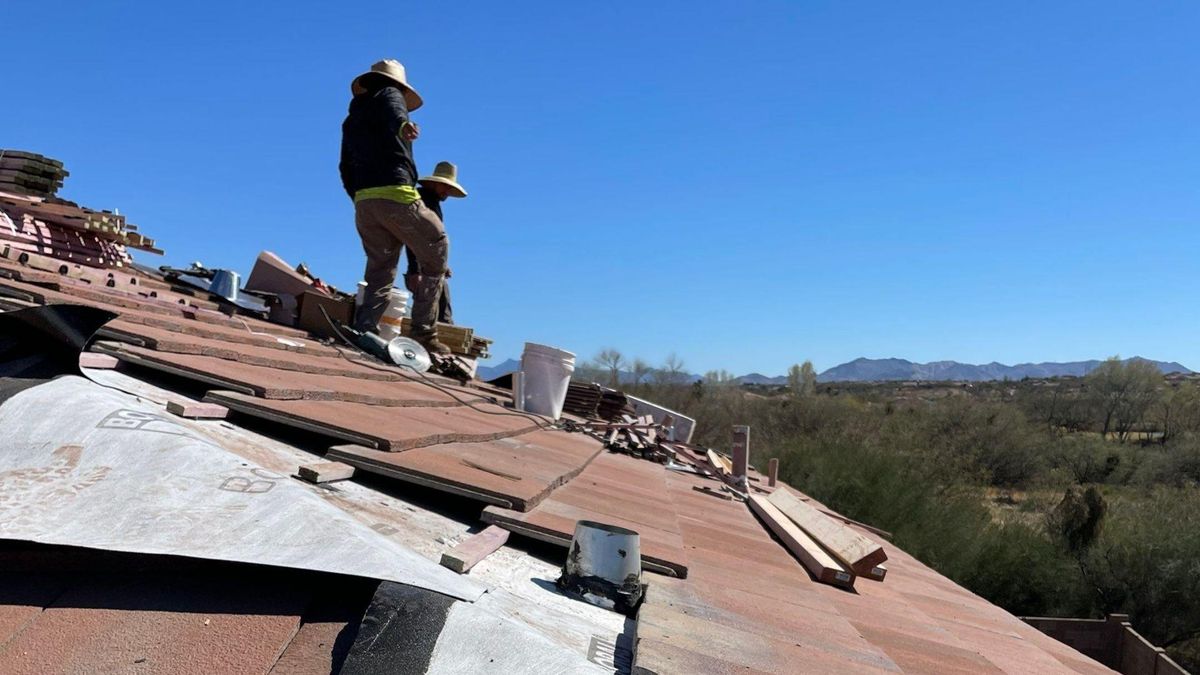 Tile roof tear-off in progress in the Tucson foothills