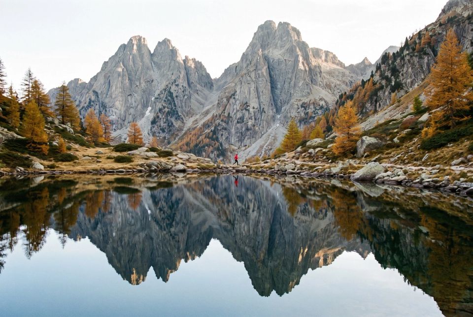 Trail running by a glacial lake in Aigüestortes i Estany de Sant Maurici national park