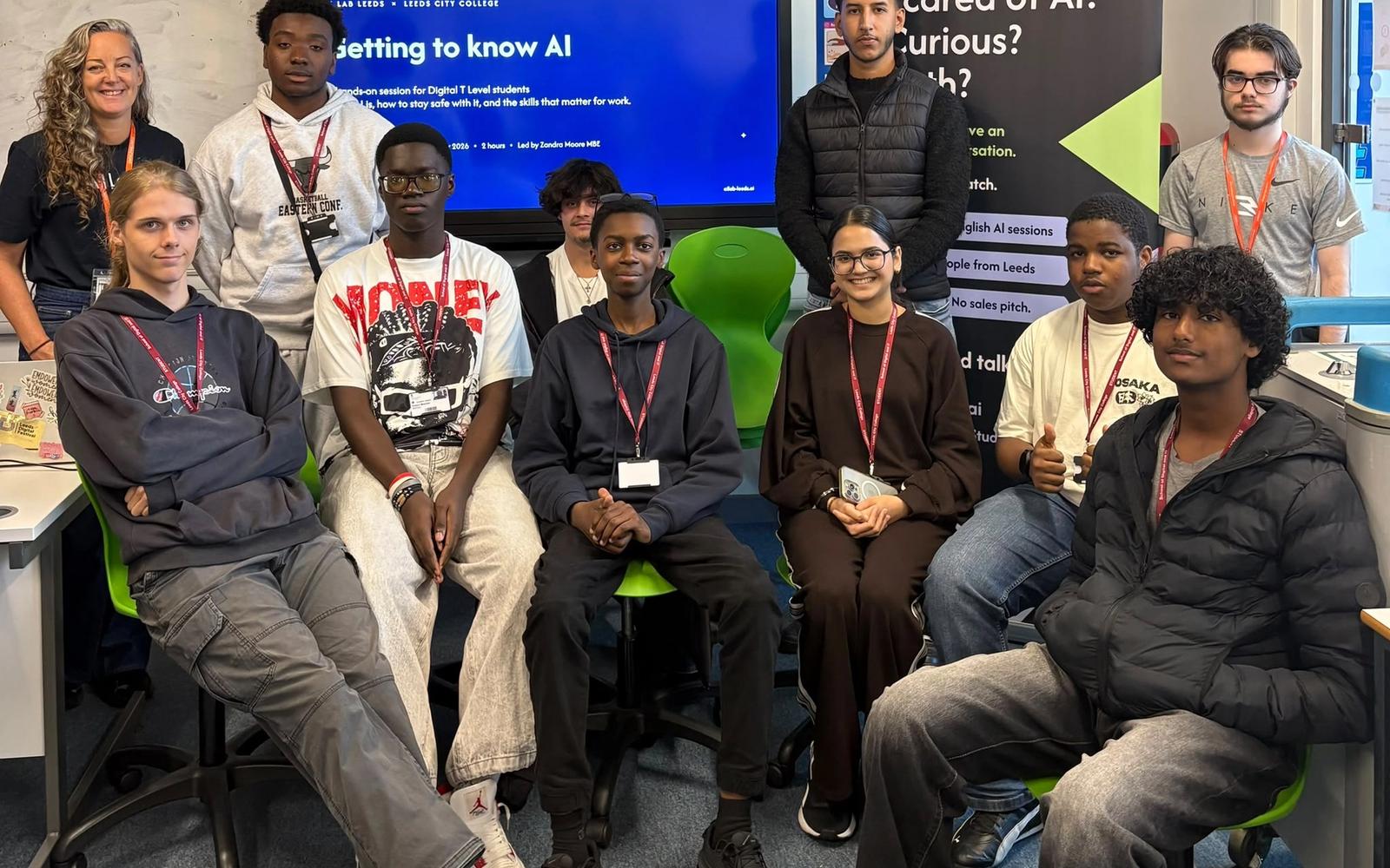 Digital T Level students and AI Lab Leeds staff gathered in a Leeds City College classroom, with the Getting to Know AI title slide on screen and an AI Lab Leeds banner behind them