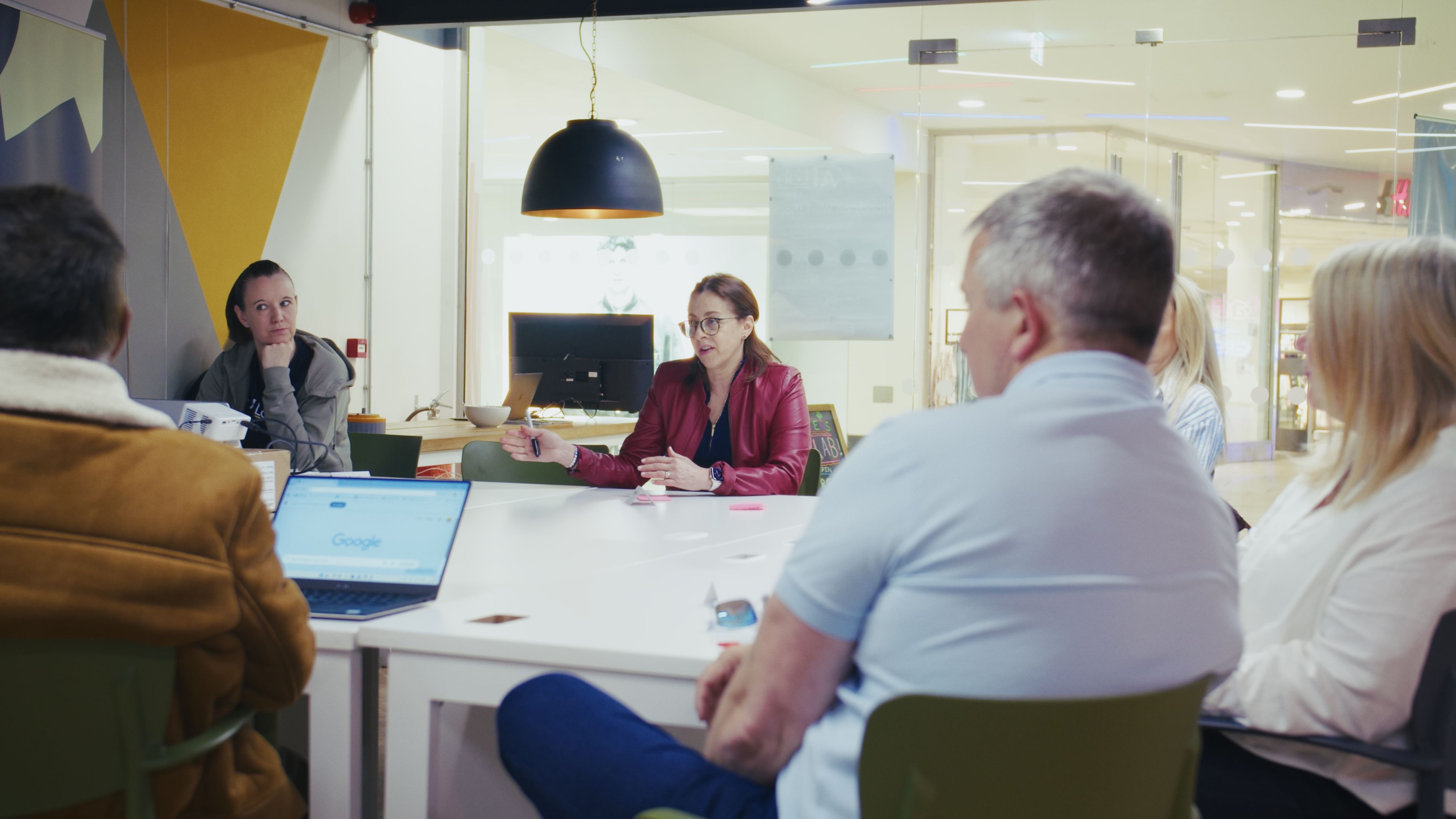 Professionals working at a shared table
