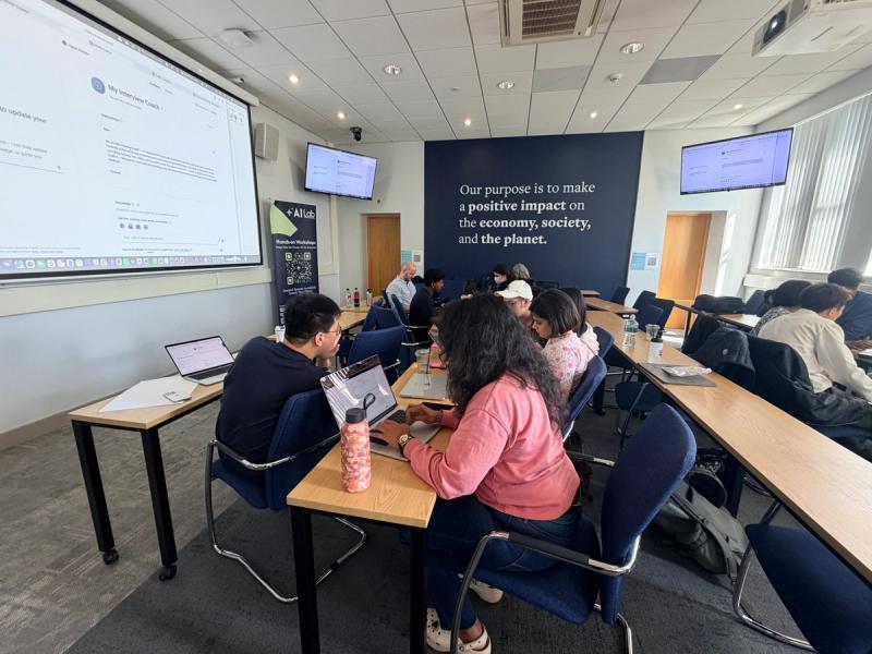 Leeds MBA cohort seated at tables with laptops during the Agentic AI Lab session, Leeds University Business School, 12 June 2026
