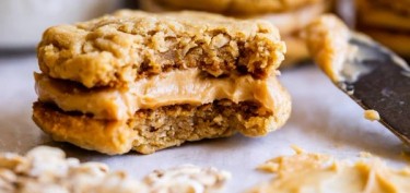 a cookie filled with a thick peanut butter paste.
