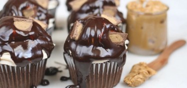 chocolate cupcakes with peanut butter and chocolate frosting.